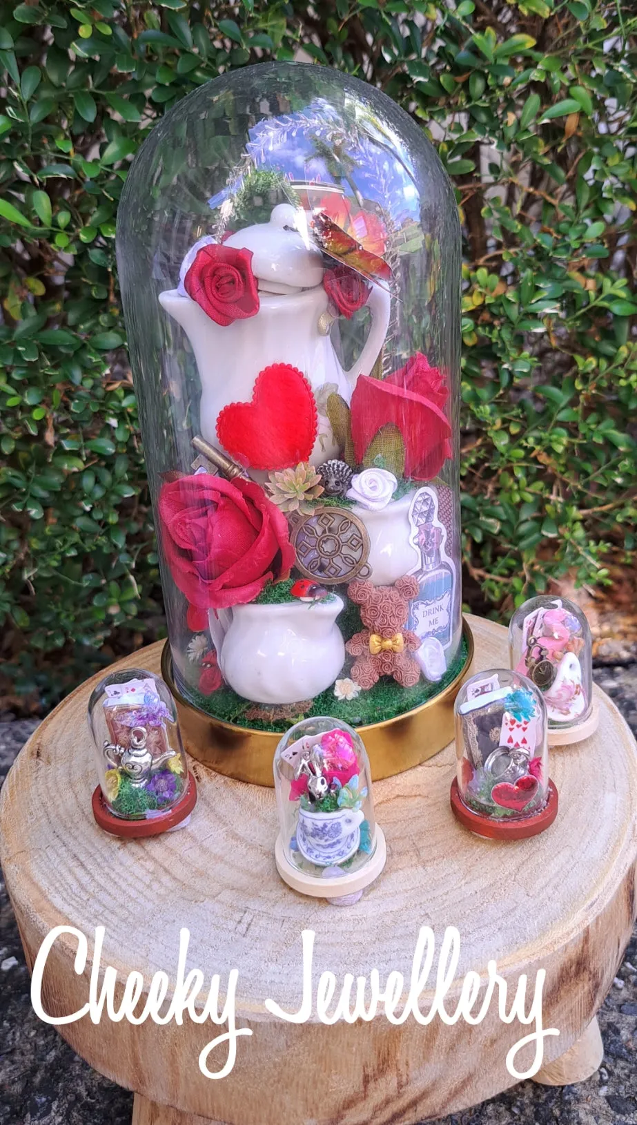 Alice in wonderland inspired dome centrepieces on glass stand. Themed party, Great gifts for birthdays and Christmas. Cute themed gifts and wedding decor.