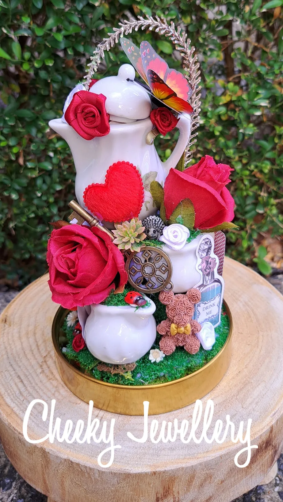 Alice in wonderland inspired dome centrepieces on glass stand. Themed party, Great gifts for birthdays and Christmas. Cute themed gifts and wedding decor.