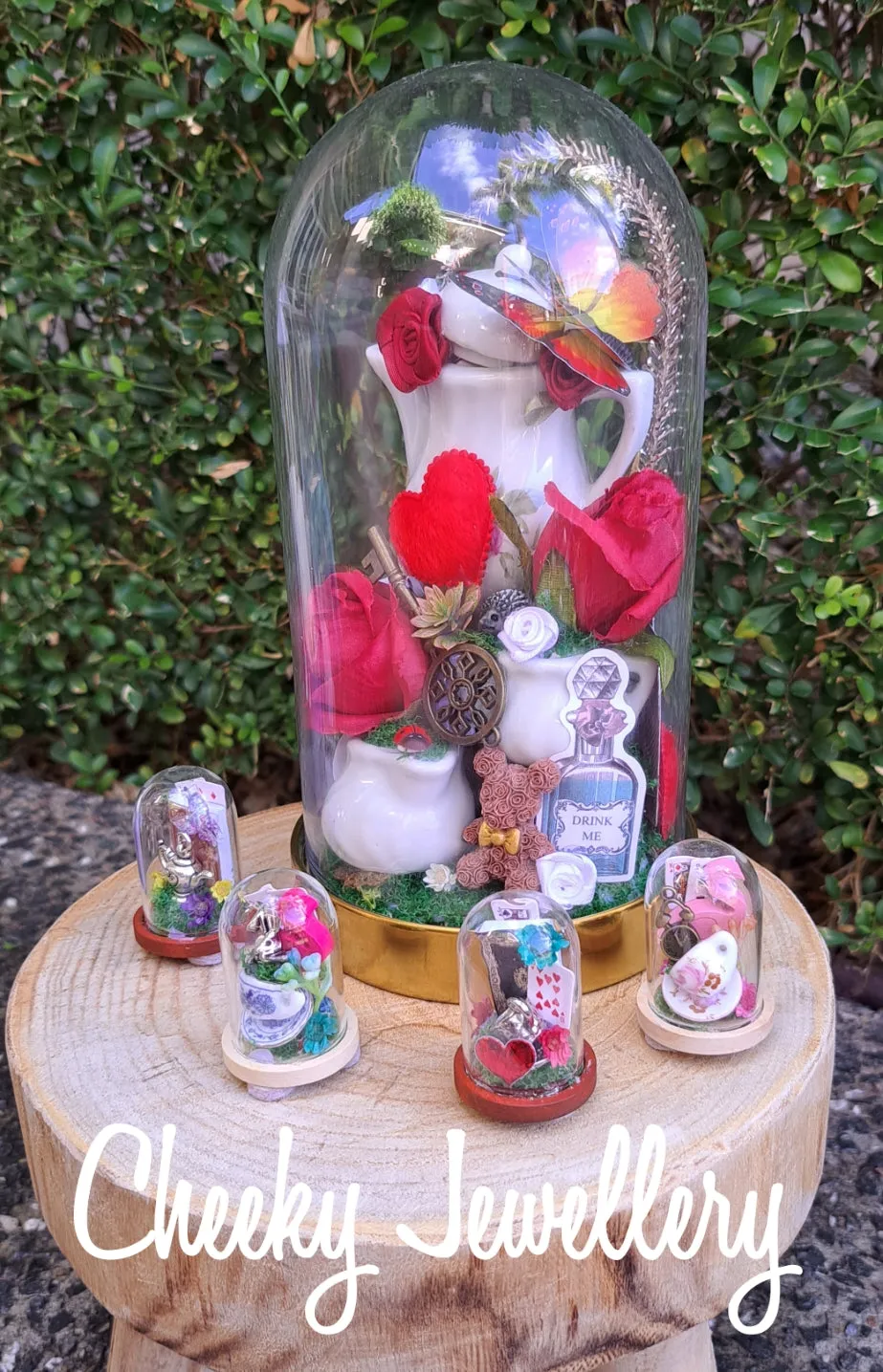 Alice in wonderland inspired dome centrepieces on glass stand. Themed party, Great gifts for birthdays and Christmas. Cute themed gifts and wedding decor.